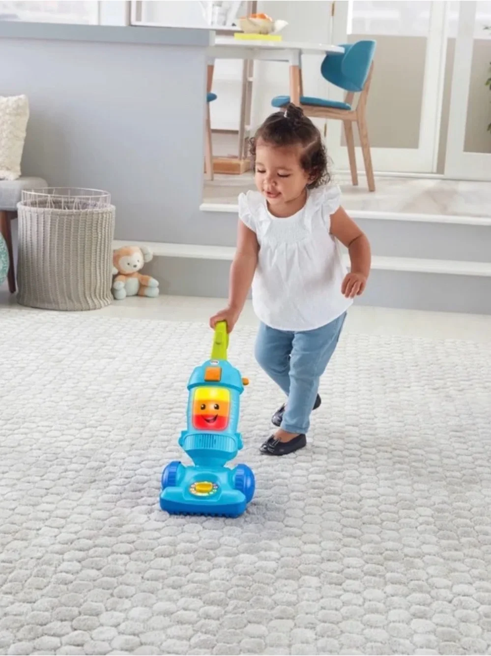 Fisher-Price Blue and Green Musical Push Vacuum Toy